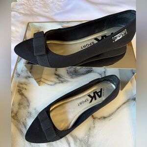 Anne Klein’s pointed toe flats are a must-have in a size 6 1/2.